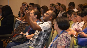 At a 2017 AACC workshop in Cali, Colombia, attendees listen to expert presentations on newborn screening in Latin America.